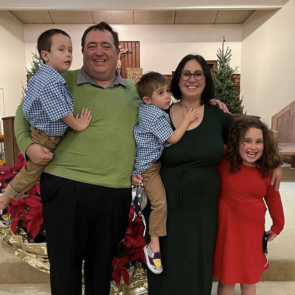 The Nestor family at Christmas time - R.J., Elisha, and their children Daisy, Wes, and A.J.